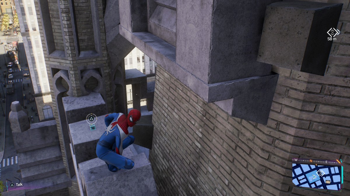 Une image montrant Spider-Man sur le côté d’une église.  En vue se trouve le trophée scientifique nécessaire pour obtenir le "Laisse tomber" trophée dans Marvel's Spider-Man 2.