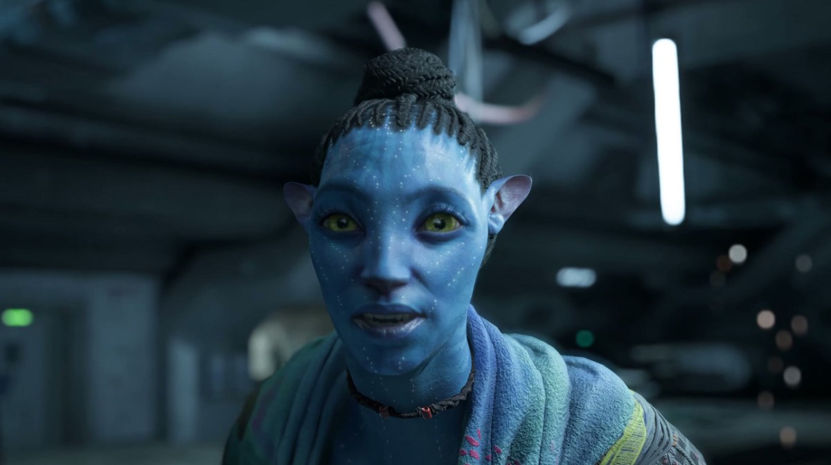 Une femme Na'vi bleue avec un chignon dans Avatar : Frontiers of Pandora.