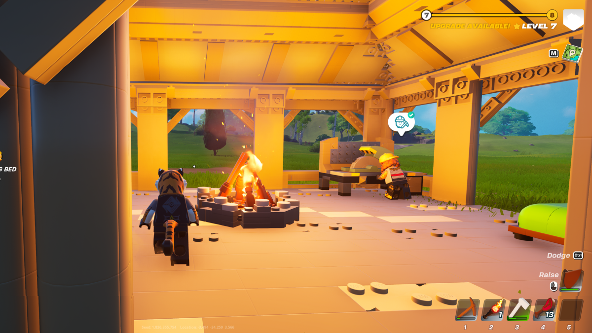 Un joueur debout à côté d'un feu de camp dans LEGO Fortnite.